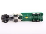 a toy train that is sitting on a white surface