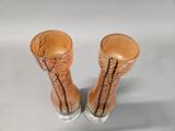a pair of boots that are sitting on a table