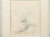 an old drawing of a map in a frame on a table