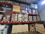 many boxes and boxes on the shelves in the warehouse