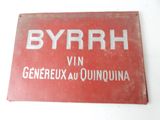 an old red sign with the word byrrh written on it