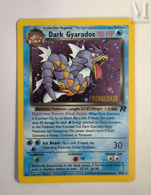 a close up of a pokemon card on a white surface
