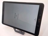 a cell phone that is sitting on top of a stand