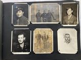 several old photos of men in military uniforms are displayed in an open book