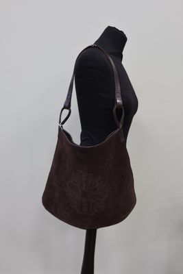 sac à bandoulière marron accroché à un mannequin, mannequin, mannequin, mannequin, mannequin, mannequin, mannequin, mannequin, mannequin, mannequin