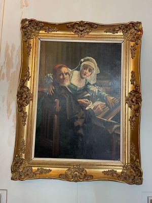 a picture of a painting hanging on the wall