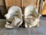two chairs that have been covered with a sheet of paper