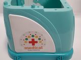 a blue and white medical box with a red cross on it