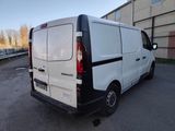 a white van that is parked in a parking lot