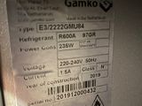 a label on the back of a machine that says gamiko