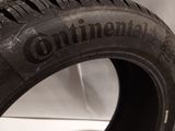 a close up of a tire with the word continental written on it