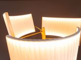 a lamp that is sitting on a table in a room