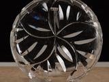 a clear glass plate with a black and white design on it