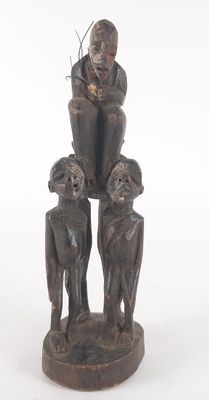 an image of a statue of a man with three children