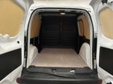 a white van with the door open and the bed in the back