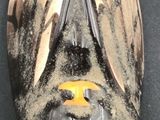 an image of a close up of a baseball glove on a table
