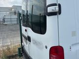 a white van that is parked in a lot