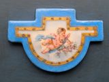 a blue cross with a picture of an angel on it
