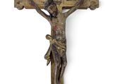 an old wooden crucifix with a cross on a white background