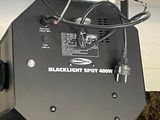 a black light that is hanging from the ceiling