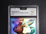 a close up of a pokemon card on a table