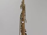 a close up of a saxophone on a white background