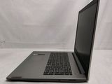 an open laptop computer sitting on top of a white surface