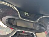 a close up of a car dashboard with a speedometer