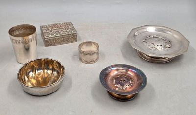 a lot of silver items that are on the table
