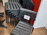 a lot of chairs that are sitting in a room