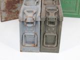 two old suitcases sitting next to each other on a table