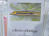a lot of pamphlets on a table with a train on it