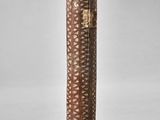 a close up of a wooden pole with a rope wrapped around it
