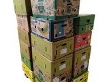 many boxes stacked on top of each other on a pallet