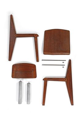 four pieces of furniture sitting on a white surface