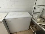 a washer and a dryer in a small room
