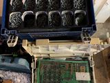 a blue box filled with lots of different types of screws