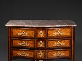 an antique chest of drawers with marble top