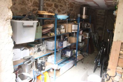 a room with a lot of items on the shelves