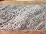 a picture of a picture of a marble slab on a table