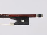 a violin bow with a wooden handle on a white background