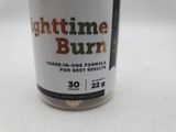 a can of light time burn sitting on a table