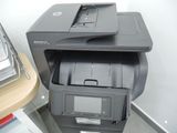 a printer that is sitting on top of a desk