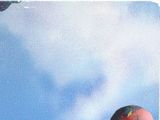a man that is flying a kite in the sky