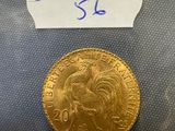 a close up of a gold coin with a label on it