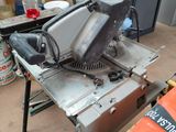 a machine that is sitting on a table in a garage