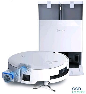 une image représentant un aspirateur robot et un distributeur