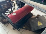 a red fire extinguisor sitting on top of a cart