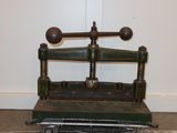 a small scale that is sitting on the floor