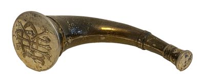 an old brass pipe with a metal handle on a white background